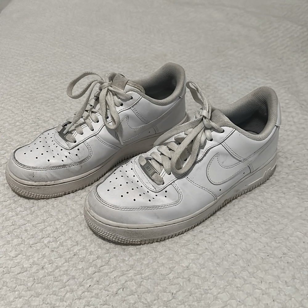 Nike Airforce 1s, white, women’s size nine, a bit beat up.